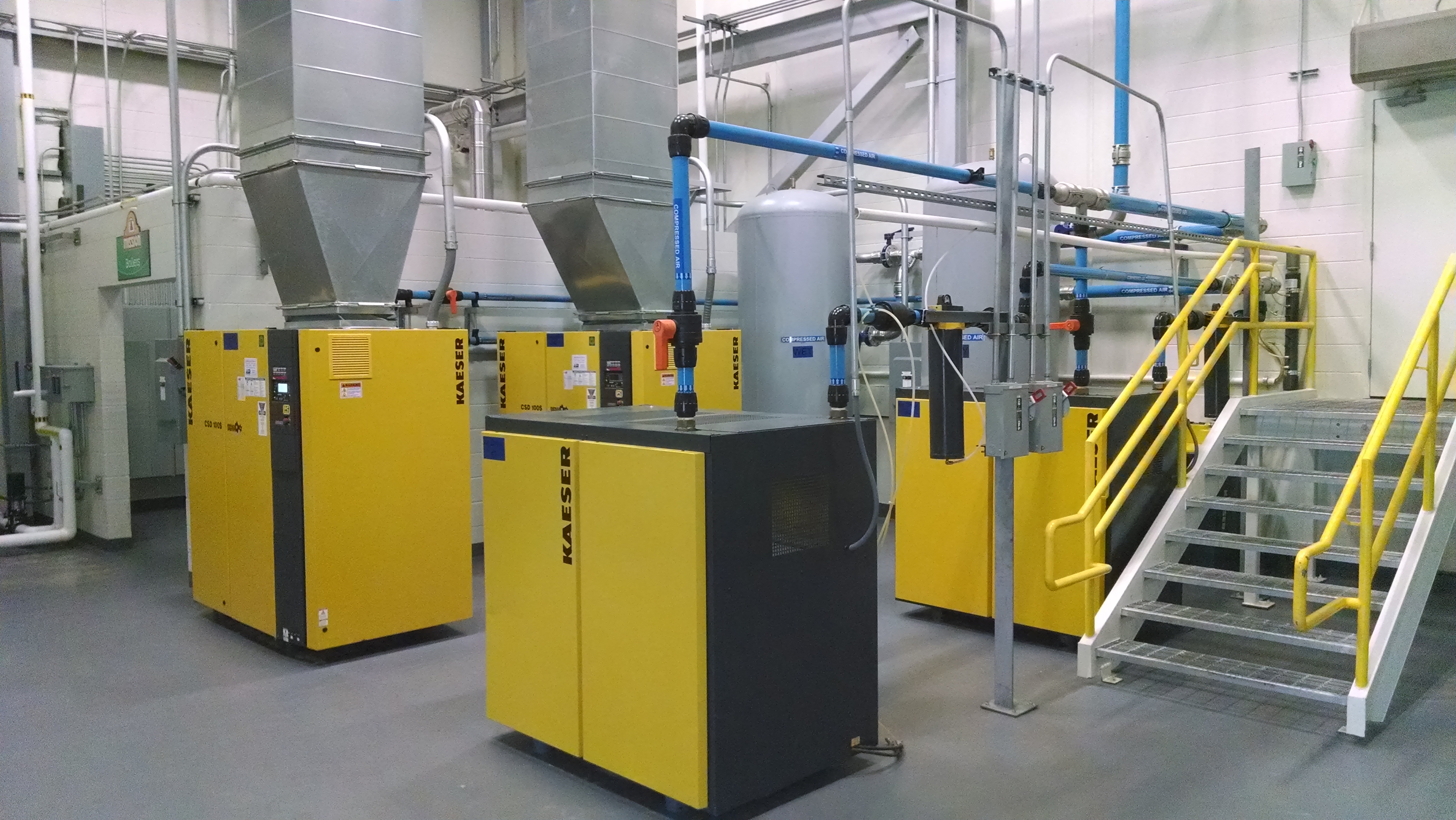 Kaeser CSD rotary screw compressors and refrigerated dryers installed at a customer facility